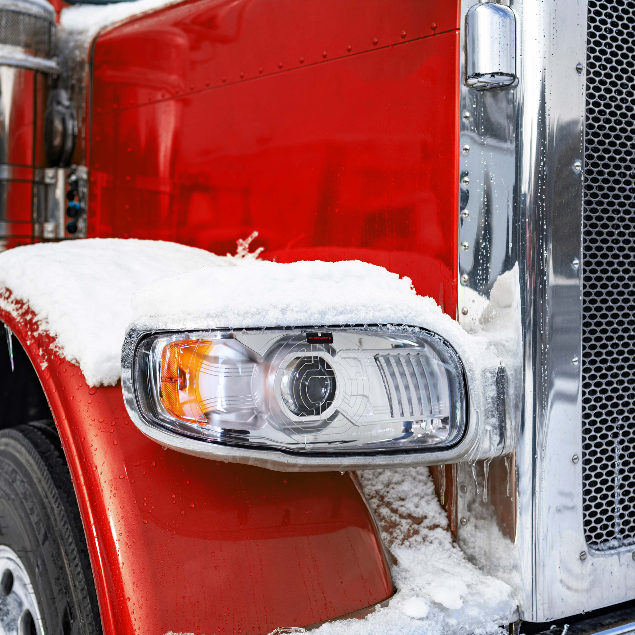 Heavy truck with LED headlights at night